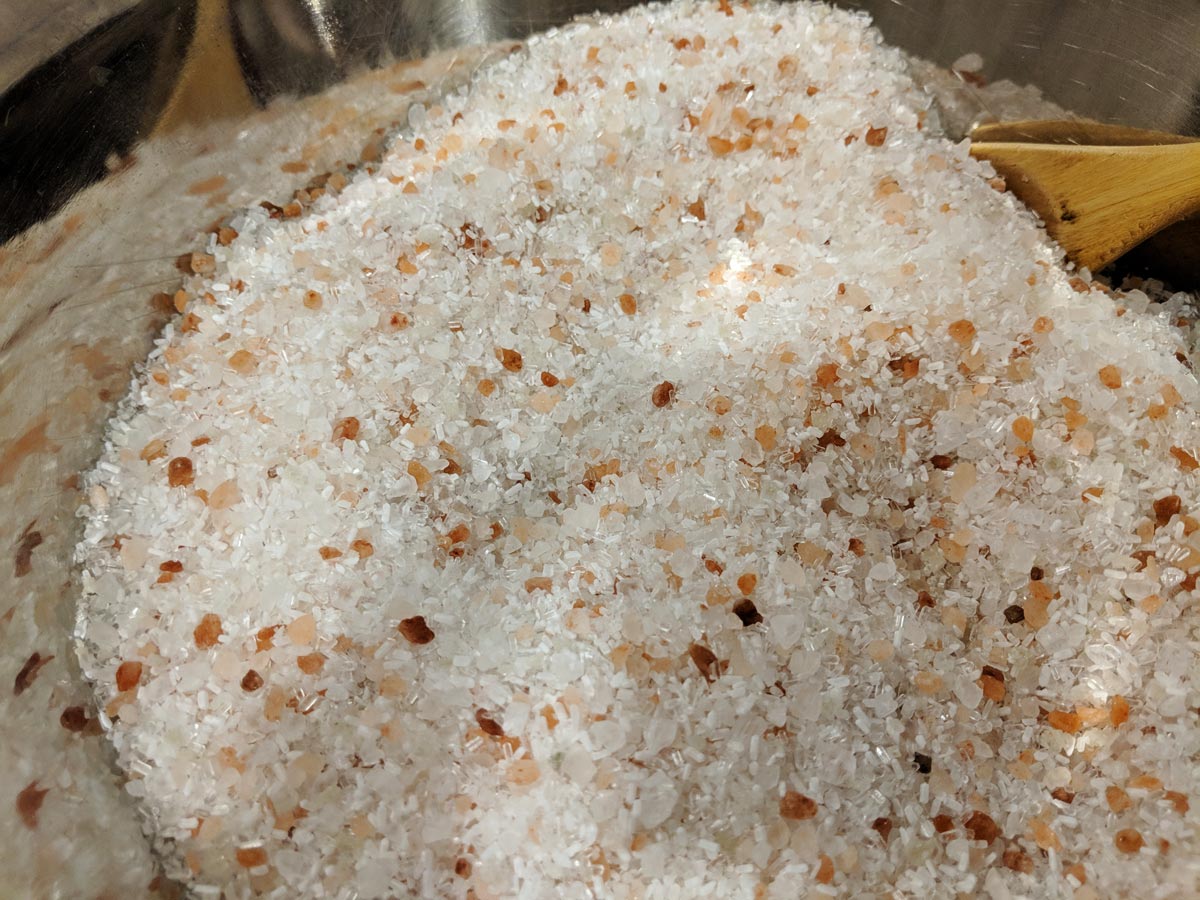 Bath salt base: a mix of salts in a silver bowl